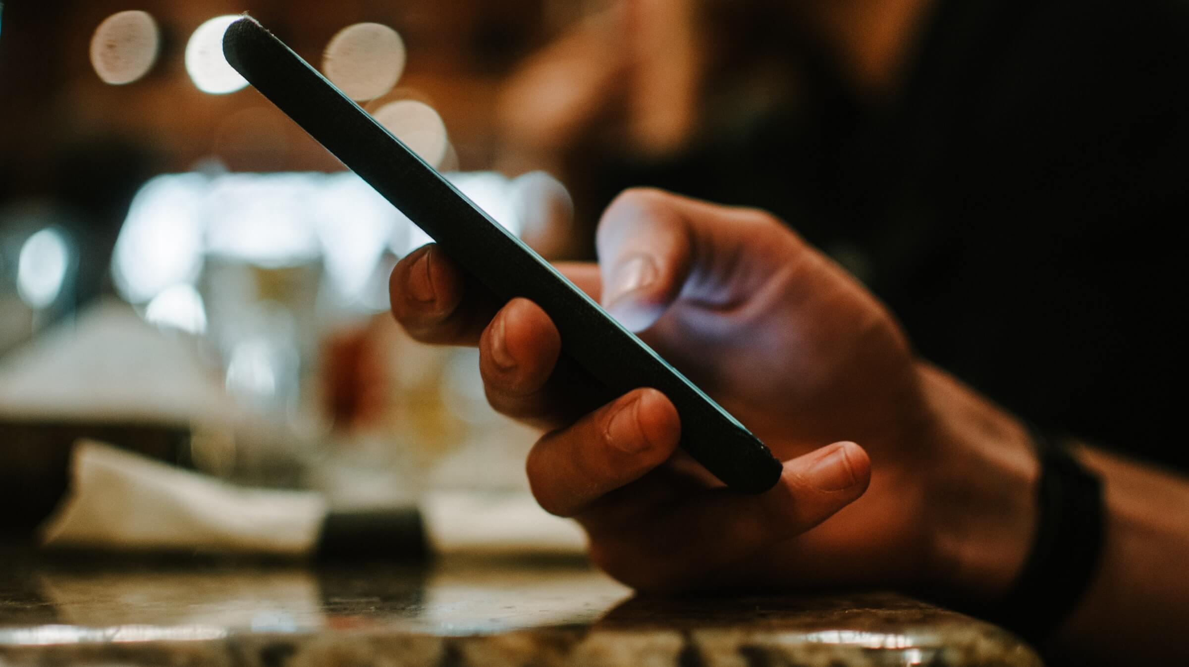 hand holding mobile phone